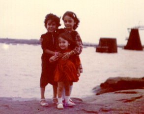 Sonal and Gazal with their friend Aarti on the banks of river Tapti in Bhusawal