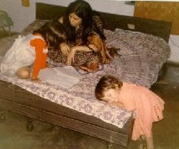 Madhu is teaching Sonal and Gazal is feeling bored since she is too young to start going to school (in Bhusaval)!