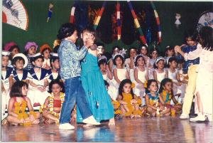 Gazal, dressed up as a Barbie doll, at a dance program in her school