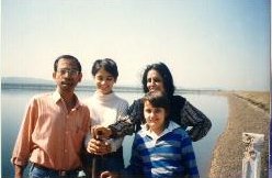Our family, returning from the trip to the hill resort of Pachmarhi, stopping by for a photo-session near a lake